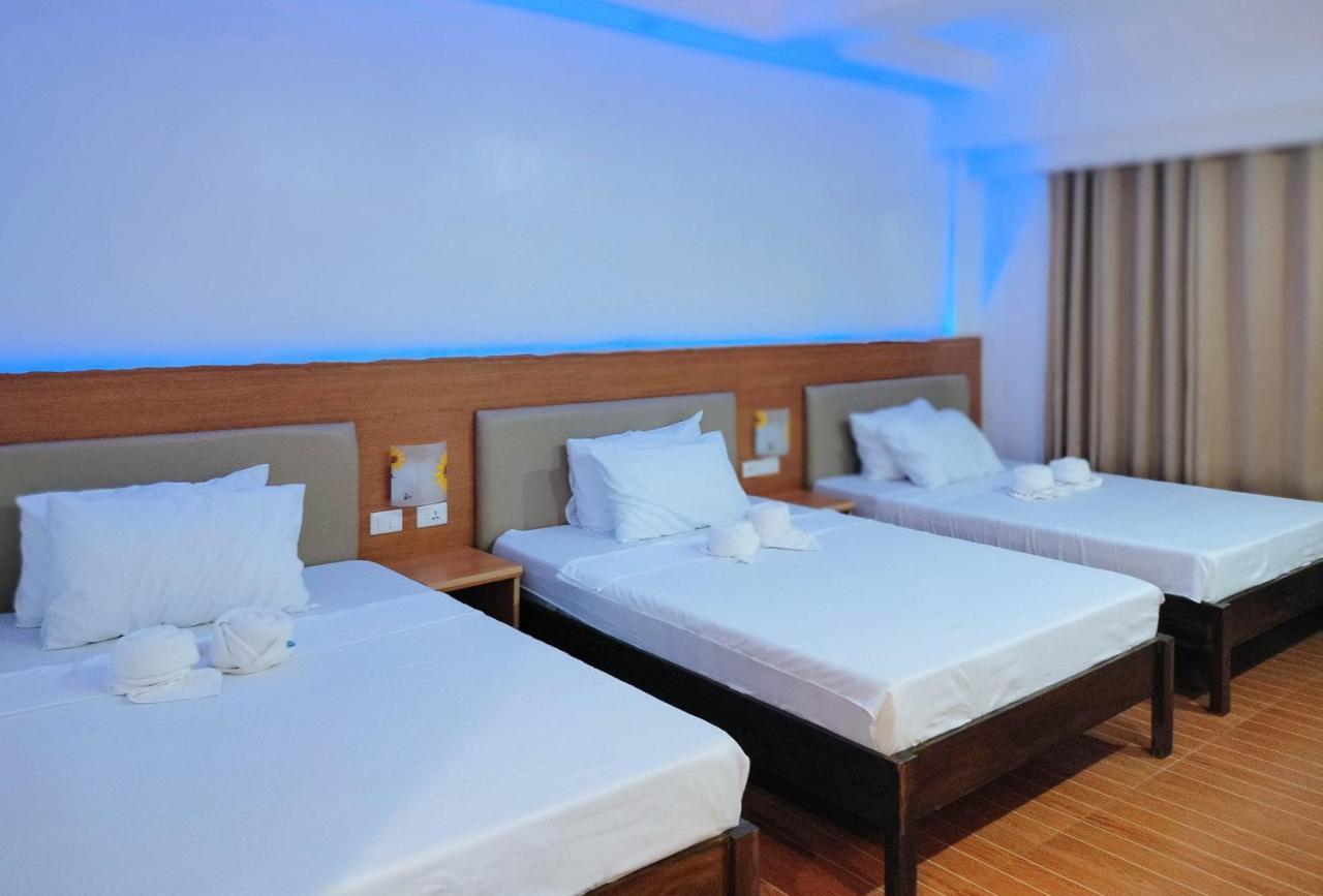 Reddoorz @ Sun Kissed Resort Guindulman Anda  Bagian luar foto