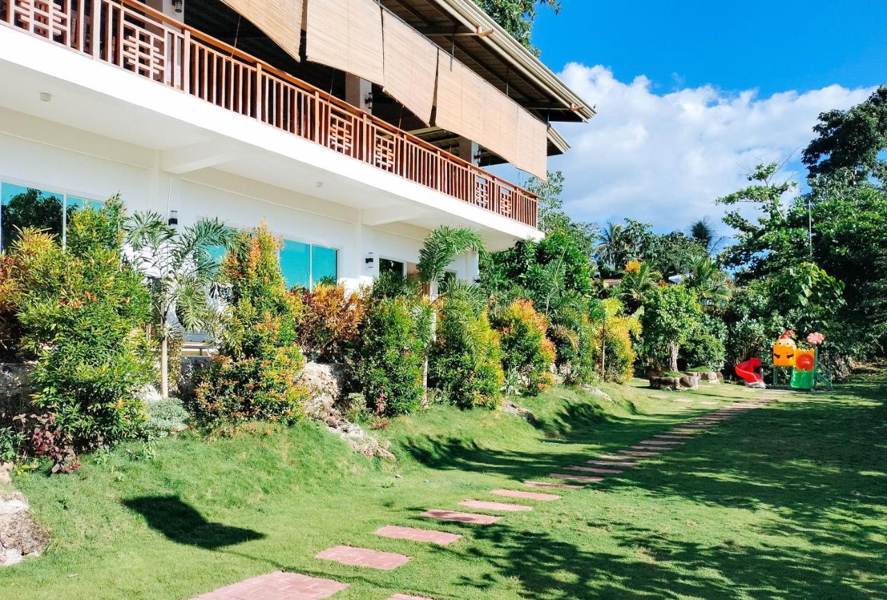 Reddoorz @ Sun Kissed Resort Guindulman Anda  Bagian luar foto
