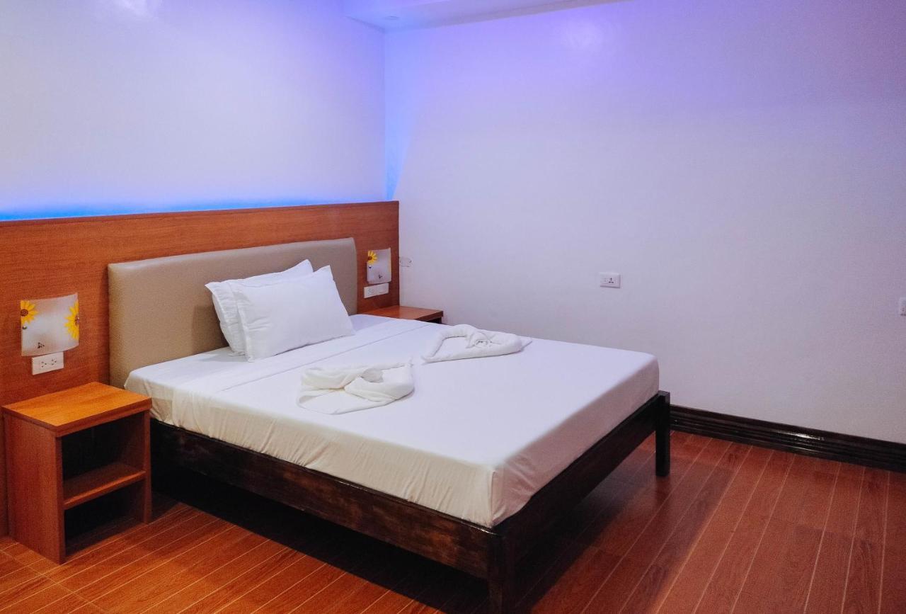 Reddoorz @ Sun Kissed Resort Guindulman Anda  Bagian luar foto