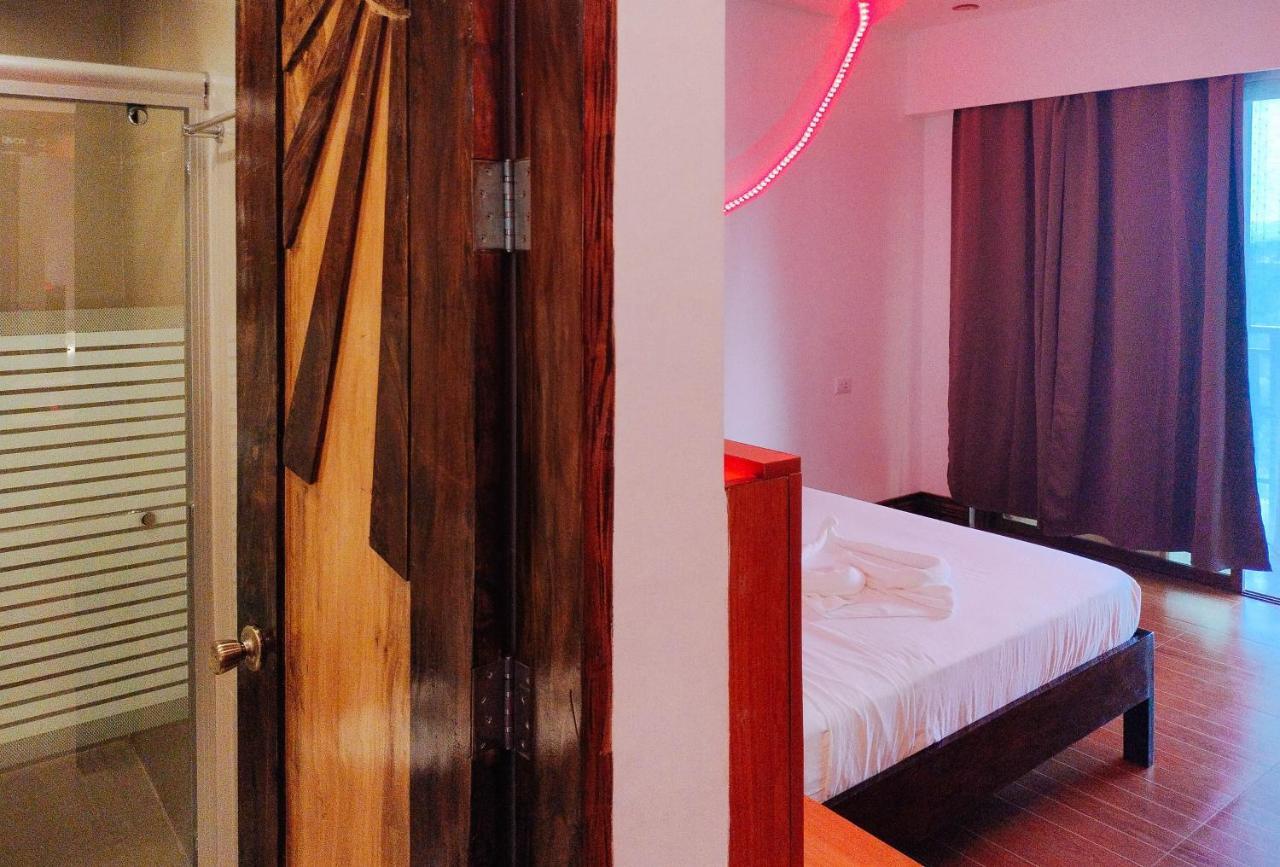 Reddoorz @ Sun Kissed Resort Guindulman Anda  Bagian luar foto