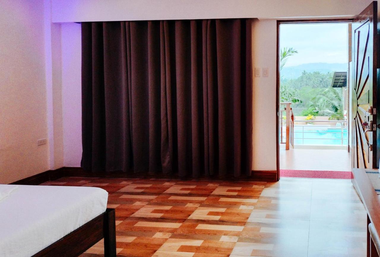 Reddoorz @ Sun Kissed Resort Guindulman Anda  Bagian luar foto