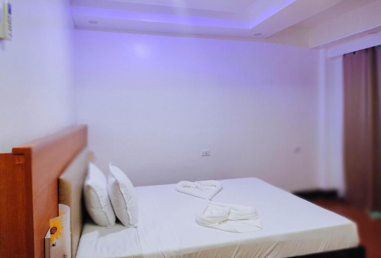 Reddoorz @ Sun Kissed Resort Guindulman Anda  Bagian luar foto